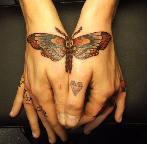 Butterfly side hand tattoos for men - butterfly tattoo on side of hand