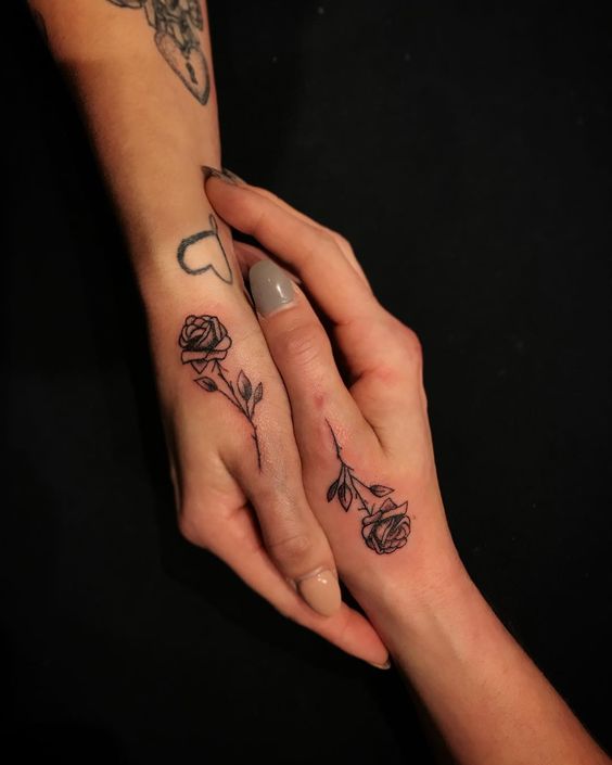 Rose side hand tattoos for females - rose tattoo on hand girl