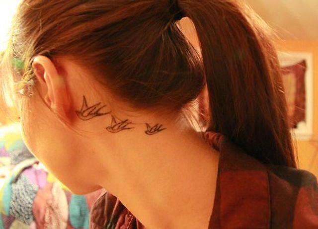 meaningful womens side neck tattoos - small neck tattoos for females