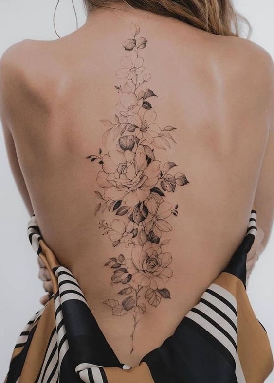 Flower Spine Tattoos - flower back tattoos for females