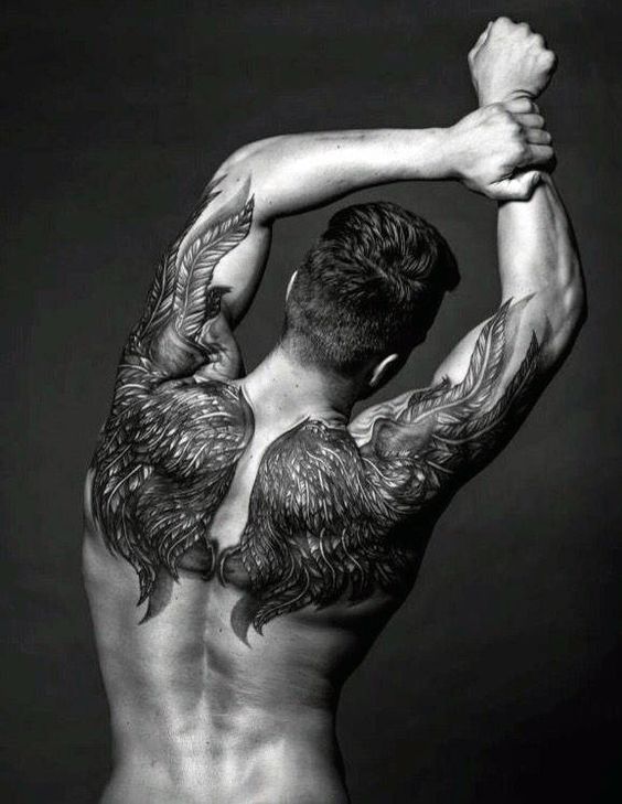Upper Back Tattoos for Men -  Small upper back tattoos for guys