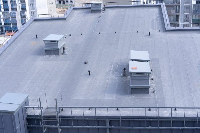 Navigating Leaks: Unveiling Solutions for Commercial Flat Roof Water Intrusion Woes