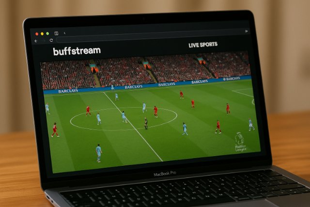 Live football match streaming on Buffstream using a MacBook Pro.
