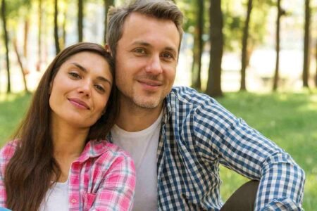 Smiling couple outdoors symbolizing strong personal relationships