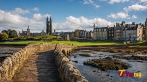 Historic St Andrews coastal town in Scotland with cathedral ruins, stone bridge, and waterfront
