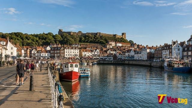 Scarborough Harbour with fishing boats and Scarborough Castle in North Yorkshire