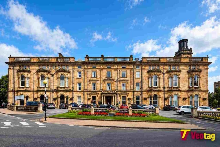 Crown Hotel Harrogate: Rooms, Facilities, Location and Booking Guide Front exterior view of Crown Hotel Harrogate with its historic stone architecture and landscaped gardens.