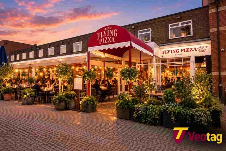 Flying Pizza Leeds: Menu, Location, Dining Experience and What to Expect Flying Pizza Leeds restaurant exterior with outdoor seating, red entrance canopy and Veotag logo