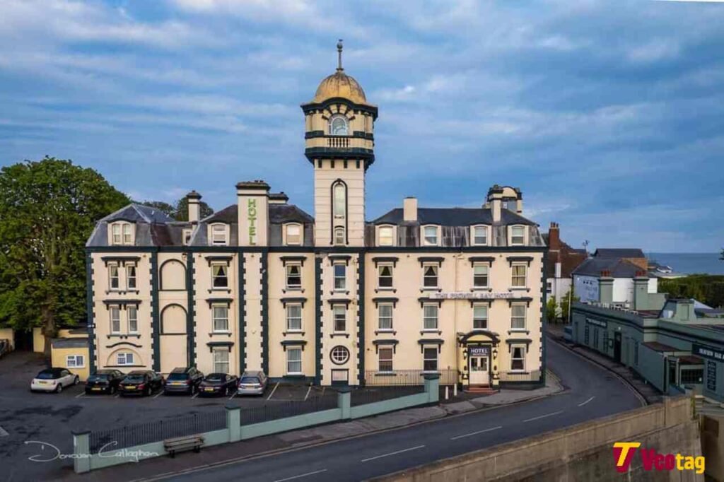 Pegwell Bay Hotel: Rooms, Sea Views, Dining and Booking Guide for 2026 Historic Pegwell Bay Hotel building with a central tower and traditional architecture near the Kent coast.